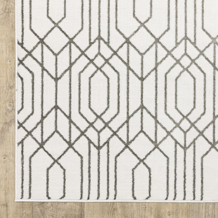 10' x 13' Geometric Power Loom Stain Resistant Area Rug - White And Gray