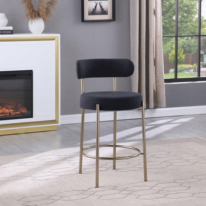 Set of 2 Giga modern Sherpa counter height barstools with brushed brass legs, upholstered seats, footrests, and low backs for dining.