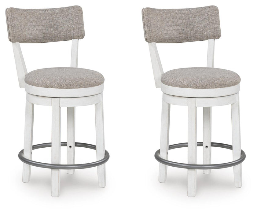 Set of two Robbinsdale upholstered swivel barstools by Signature Design in antique white, featuring padded seats and modern design.