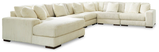 Signature Design by Ashley Lindyn 6-piece stationary sectional sofa with plush cushions and modern design in a neutral fabric.