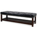 Giga upholstered bedroom end of bed bench with tufted design, nailhead trim, wooden shelf, and cushioned footstool for living room use
