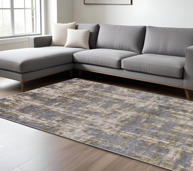 8' x 11' Abstract Stain Resistant Area Rug - Gray And Gold