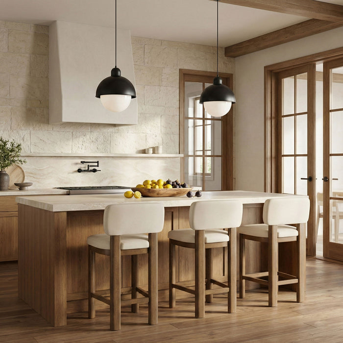 Set of two Meridian Furniture Paloma faux leather counter stools with brown frames, upholstered seats and sleek modern design.