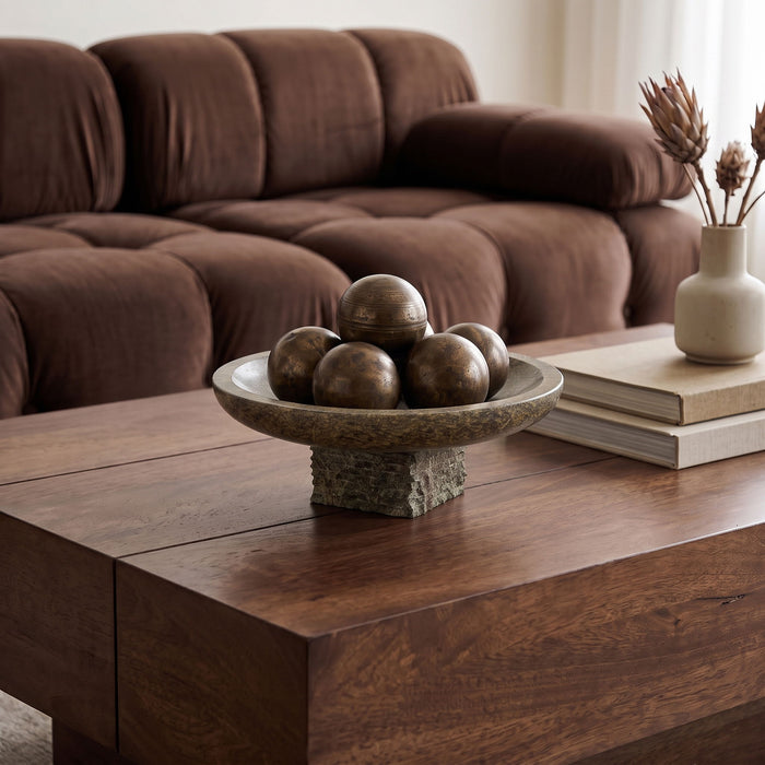 Marble bowl from Meridian Furniture's Colannade collection, featuring a smooth, polished surface and elegant marble pattern.