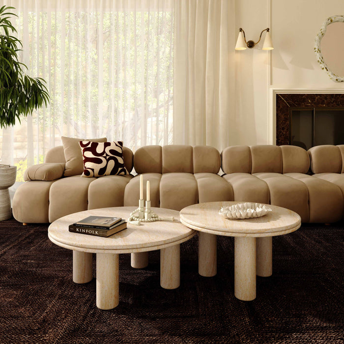 Pair of TOV Furniture Amora indoor/outdoor nesting accent tables with travertine tops and sleek metal bases, set of two.