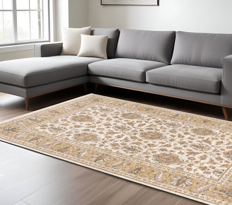 6' x 9' Oriental Power Loom Stain Resistant Area Rug With Fringe - Ivory And Gold
