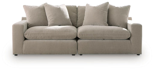 Benchcraft® Maxton Heights 2-piece sectional sofa in pebble fabric, stationary design with plush cushions and modern style.