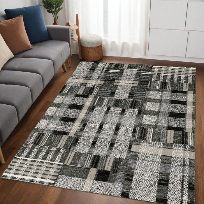 5' x 7' Geometric Power Loom Area Rug - Gray And Black