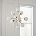 HomeRoots Sputnik Eleven chandelier with frosted glass shades, gold metal frame, and dimmable lighting for modern interior decor.