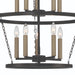 HomeRoots black and gold ten-light metal chandelier with candle-style design and dimmable feature, hanging fixture for elegant lighting.