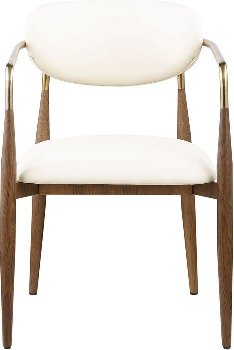 Vegan leather upholstered dining arm chair with walnut wood legs, modern design by Meridian Furniture, shown from the side.