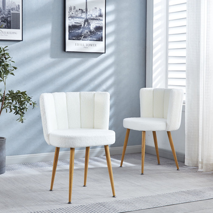 Set of two Giga modern dining chairs with wood-colored iron tube legs, cushioned seats, and comfortable backrests.