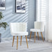 Set of two Giga modern dining chairs with wood-colored iron tube legs, cushioned seats, and comfortable backrests.