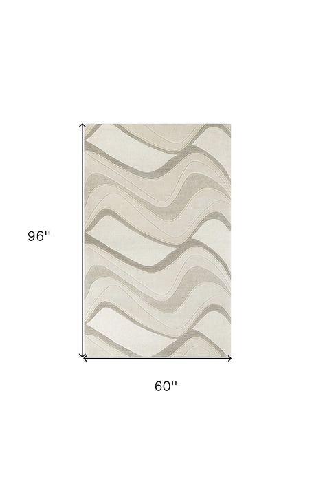 5' x 8' Hand Tufted Abstract Waves Indoor Area Rug - Ivory