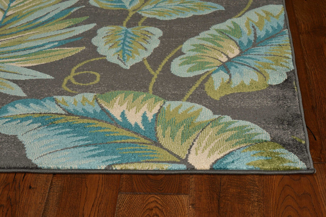 8' x 11' Machine Woven Oversized Tropical Leaves Indoor Area Rug - Gray Teal