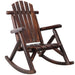 Giga wooden porch rocker chair made of fir log with curved armrests and slatted back for outdoor relaxation.