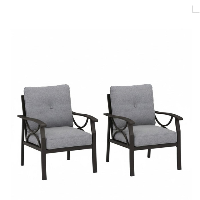 Set of two Giga all-weather armchairs with cushions, featuring a sculptural design in gray and khaki for outdoor seating.