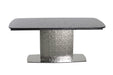 Contemporary NORA extendable dining table by Chintaly with gloss black textured glass top and stainless steel base.