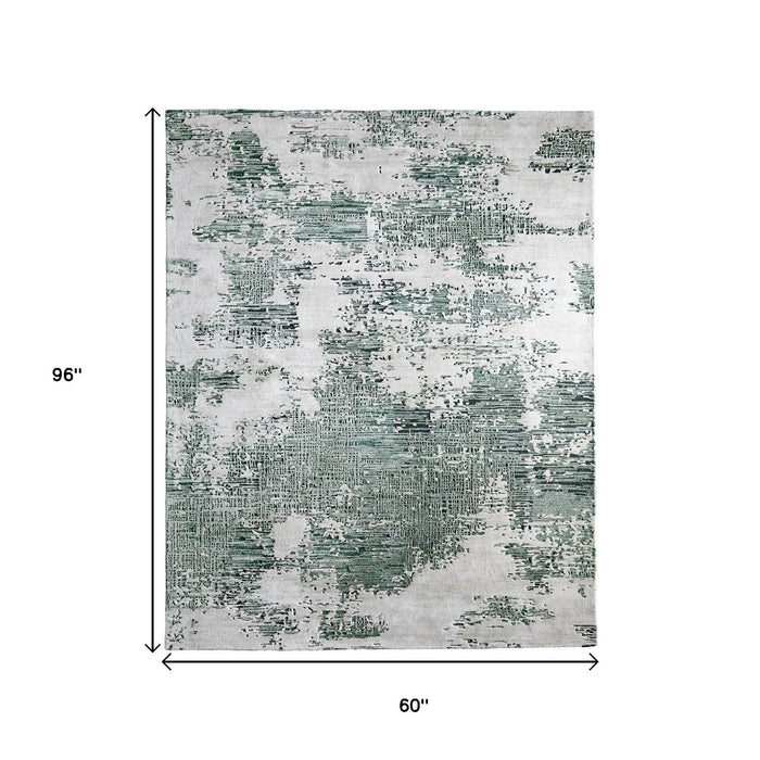 5' X 8' Abstract Hand Tufted Area Rug - Green And White
