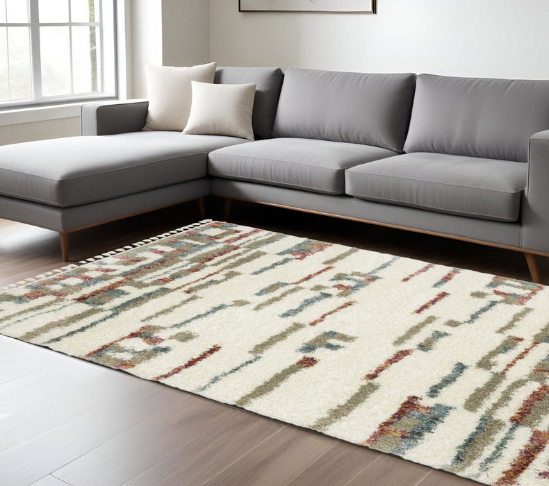 10' X 13' Abstract Shag Distressed Area Rug With Fringe - Tan