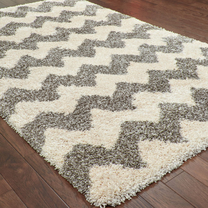 10' x 13' Geometric Shag Power Loom Stain Resistant Polypropylene Area Rug - Ivory And Gray