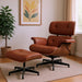 Light brown tufted genuine leather swivel lounge chair with matching ottoman, featuring walnut wood accents and a modern design.