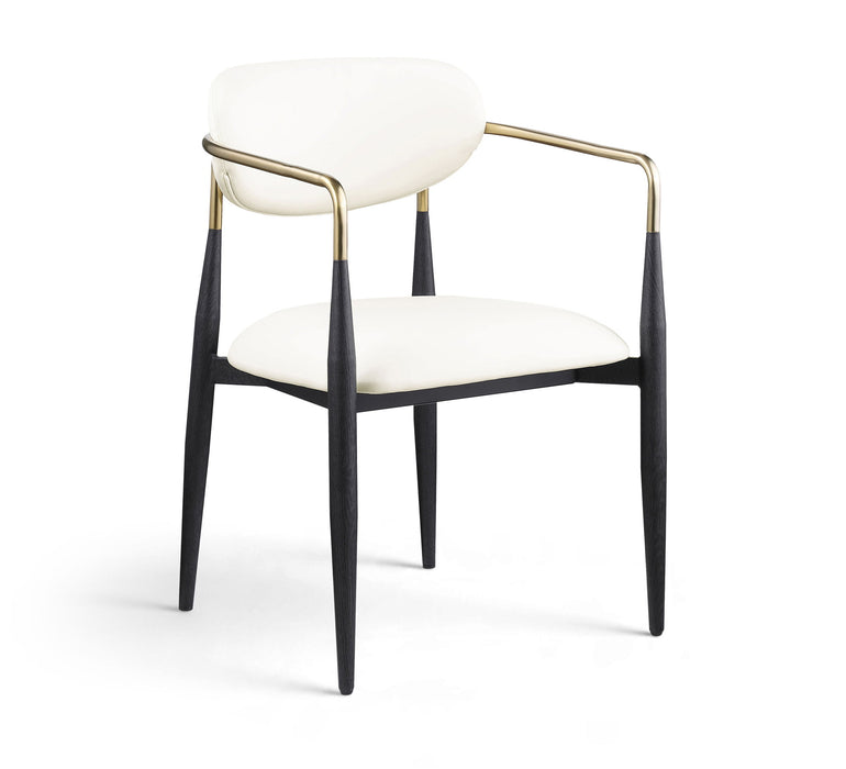 Black-legged vegan leather upholstered dining arm chair by Meridian Furniture with a sleek, modern design and padded seat.