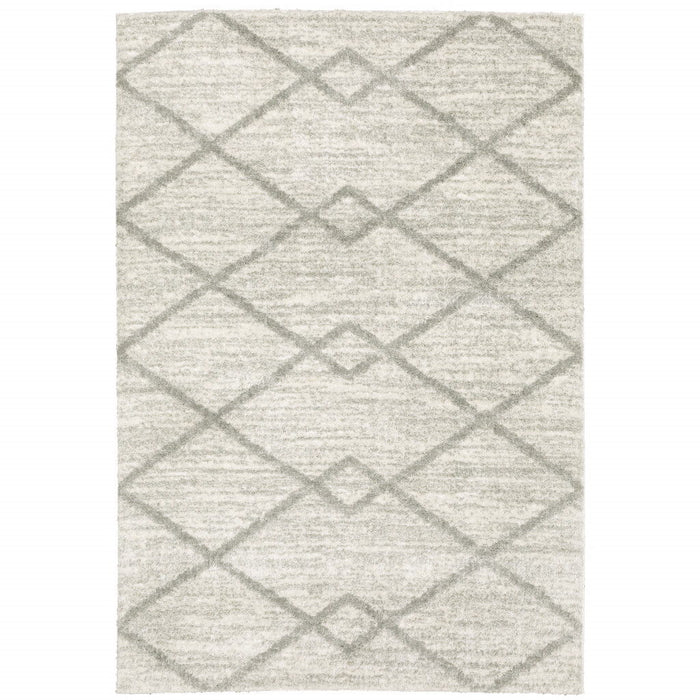 9.8' x 12.8' Geometric Shag Power Loom Stain Resistant Area Rug - Ivory And Grey