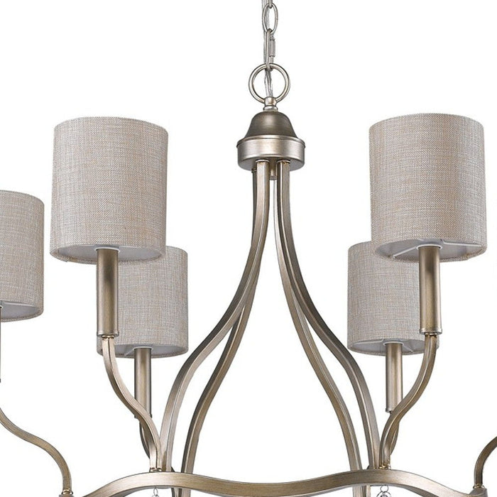 HomeRoots gold metal chandelier with six candle-style lights and white shades, dimmable for elegant lighting.
