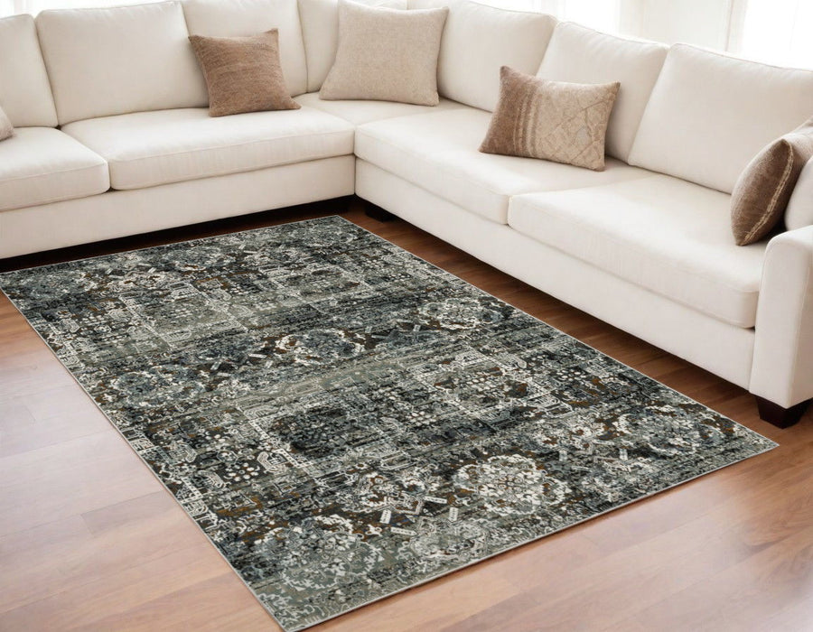 5' x 8' Oriental Power Loom Stain Resistant Area Rug - Ivory Charcoal Gray Blue Rust Gold And Brown