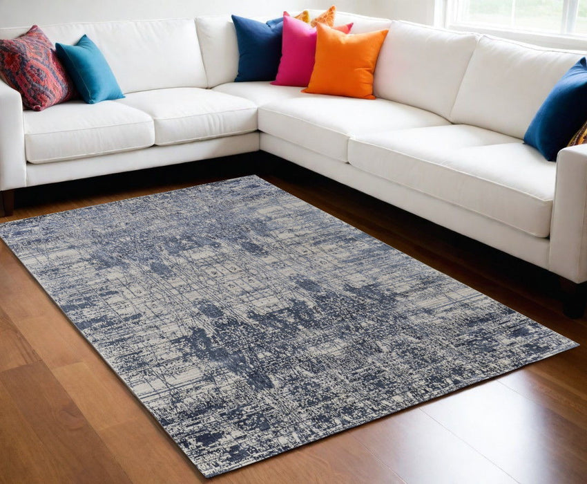 5' x 8' Abstract Hand Woven Worn Faded Area Rug - Blue And Ivory