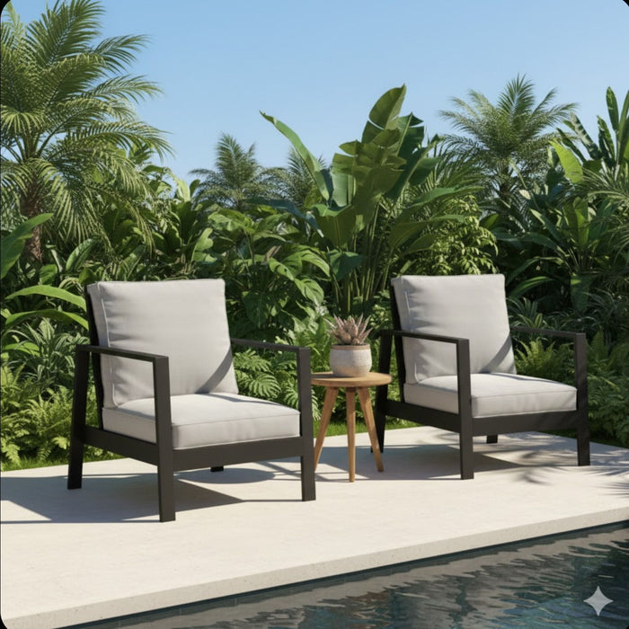 Set of two Giga all-weather ergonomic patio armchairs with thick cushions, ideal for outdoor seating and relaxation.