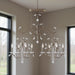 HomeRoots 29-inch eight-light metal chandelier with clear shades and nickel finish, dimmable lighting for elegant home decor.