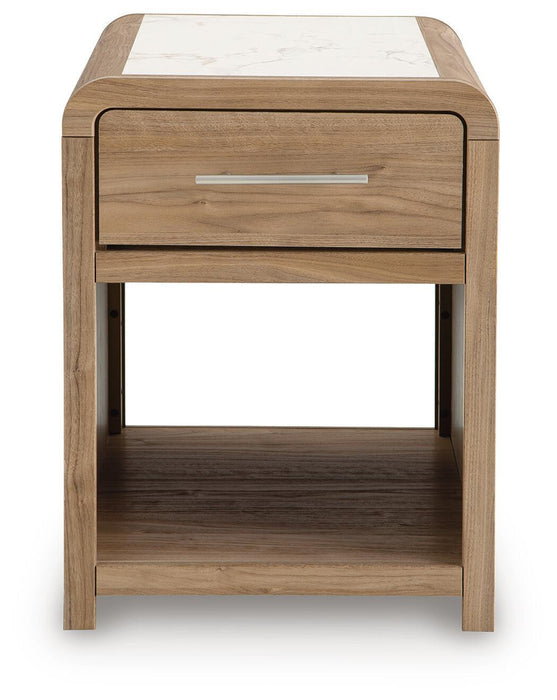 Signature Design by Ashley rectangular cocktail table with a sleek wood finish, perfect for living room or lounge decor.