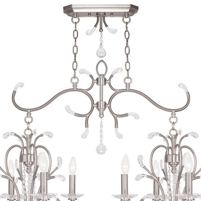 HomeRoots 29-inch eight-light metal chandelier with dimmable shades in nickel and clear glass, modern lighting fixture for dining or living rooms.