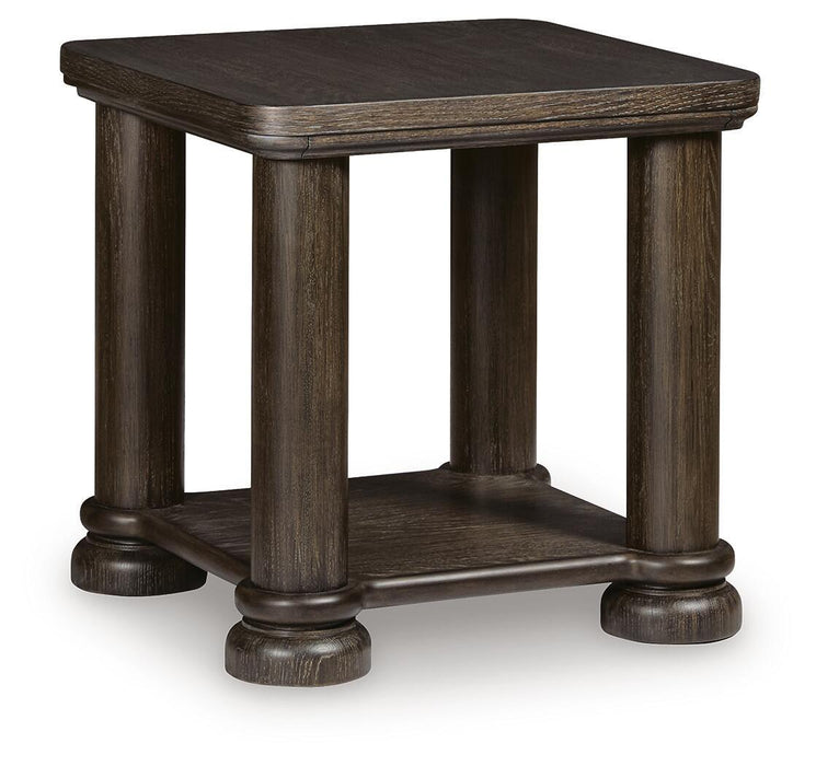 Rectangular cocktail table from Signature Design by Ashley®, featuring a sleek wooden surface and sturdy legs.