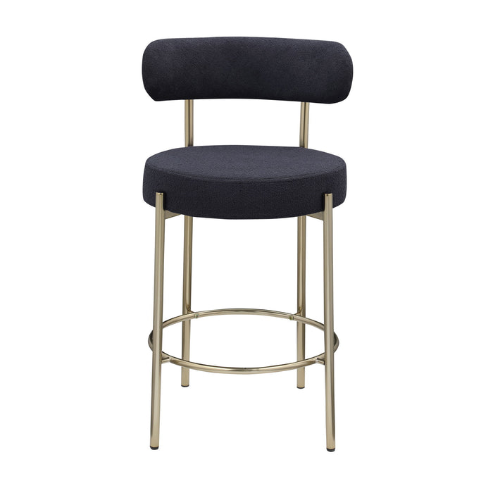 Set of two Giga modern Sherpa counter height barstools with brushed brass legs, low back, footrest, and upholstered seats for dining.