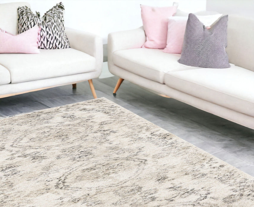 9' x 13' Machine Woven Distressed Floral Traditional Indoor Area Rug - Gray