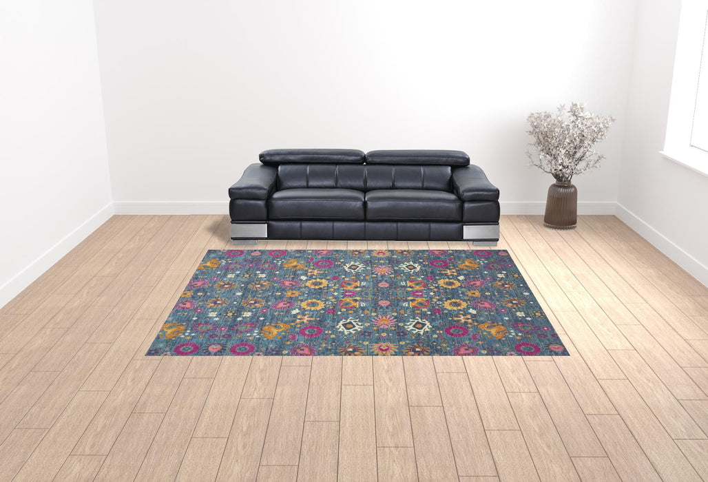 9' x 12' Floral Power Loom Polypropylene Area Rug - Blue