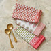 Set of four TOV Furniture Crissy cotton canvas printed napkins with rust vintage floral design on soft fabric.