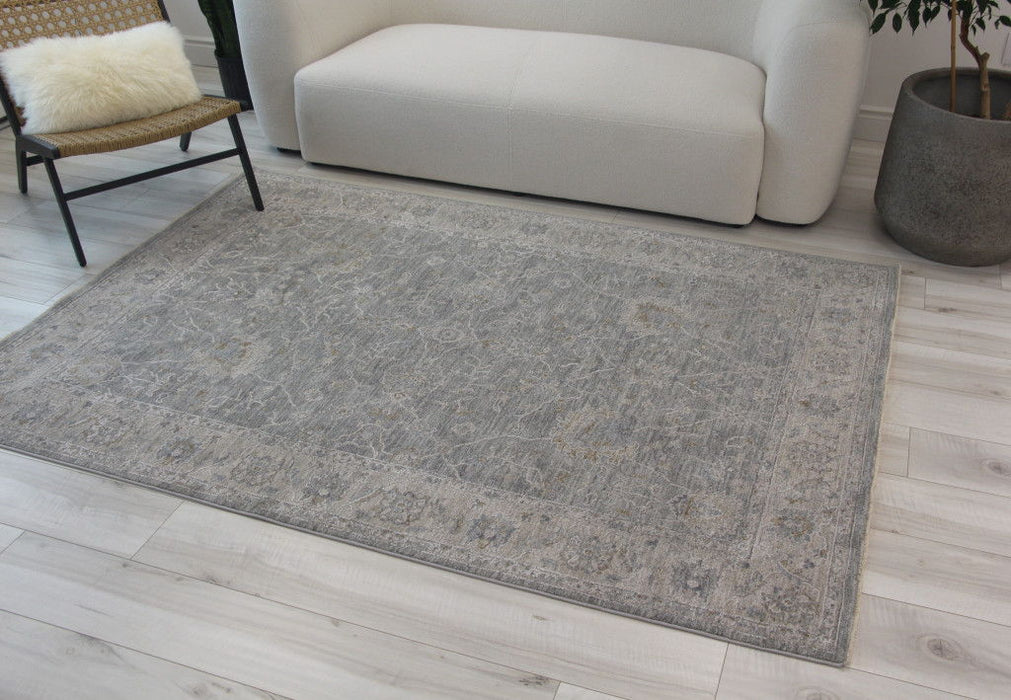 9' x 12' Southwestern Floral Stain Resistant Area Rug - Blue Gray