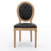 Set of Giga French-style solid wood dining chairs with nailhead trim, wood legs, and antique design, perfect for elegant dining rooms.