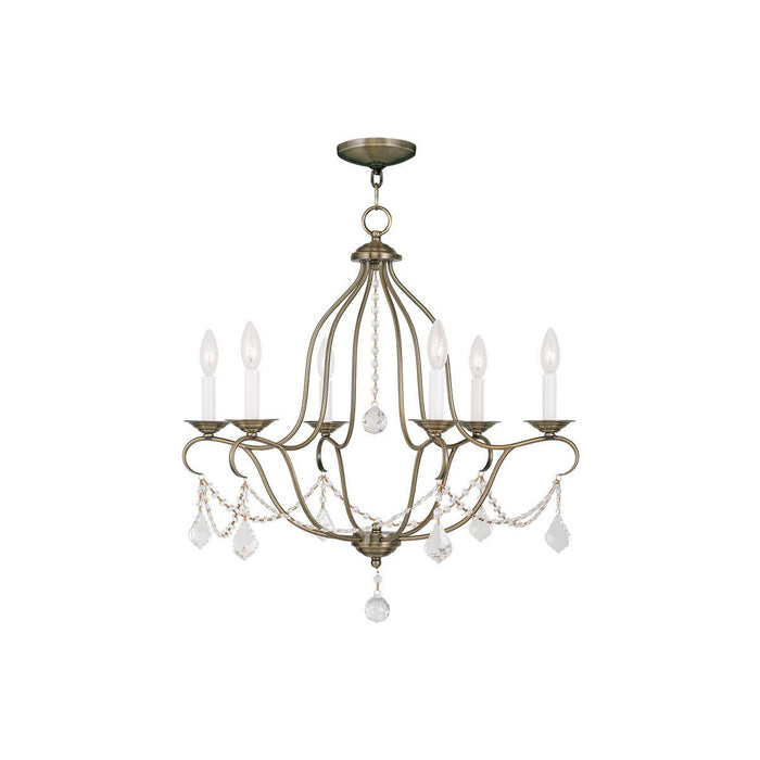 26-inch six-light dimmable chandelier with shades in antiqued brass finish, featuring elegant design and decorative detailing.