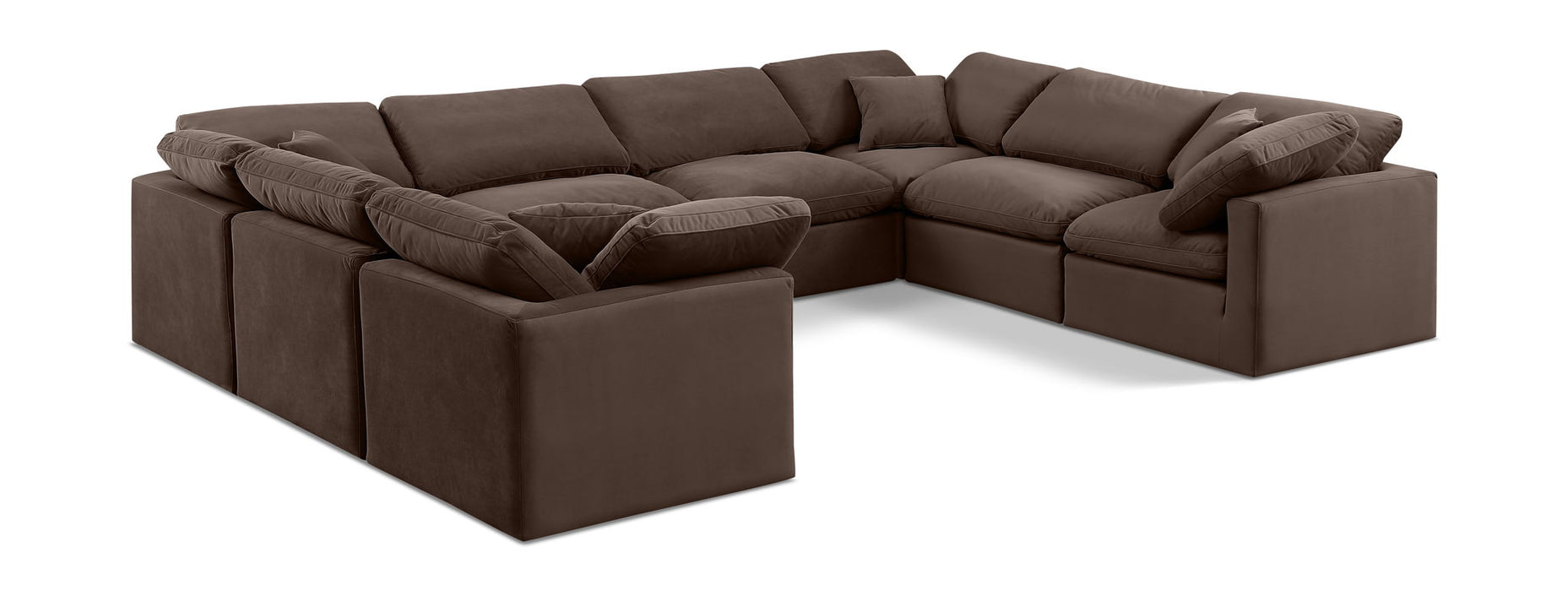 Velvet Meridian Furniture Indulge 8-piece stationary sectional sofa with modular design and plush cushions, in rich velvet fabric.