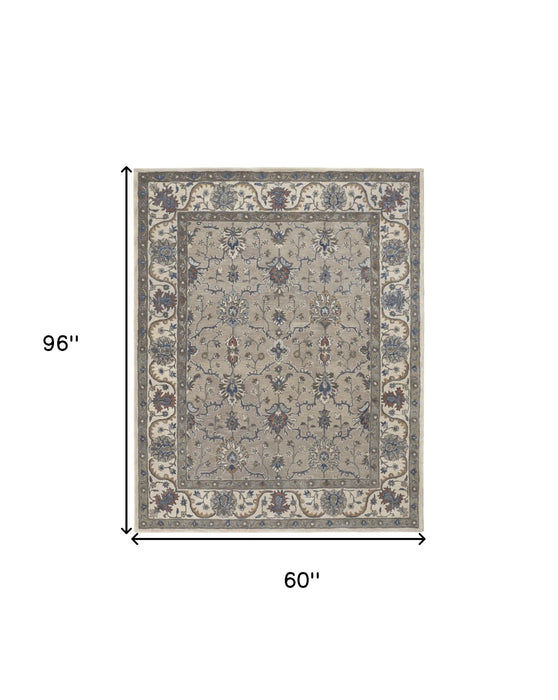 5' x 8' Floral Hand Tufted Area Rug - Ivory And Blue