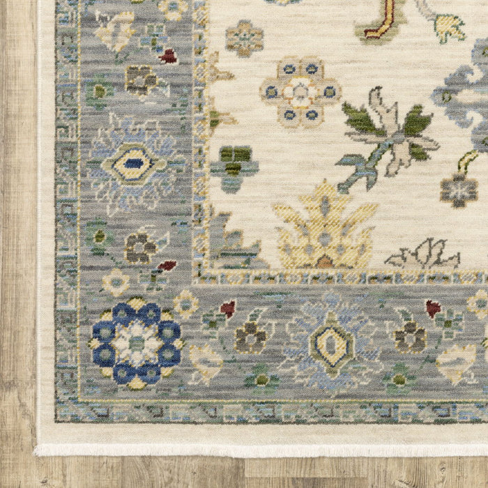 6' x 9' Oriental Power Loom Stain Resistant Area Rug With Fringe - Ivory Blue Gray Teal Gold Green And Rust