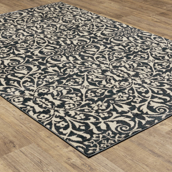 9.8' x 12.8' Floral Power Loom Stain Resistant Area Rug - Blue And Ivory