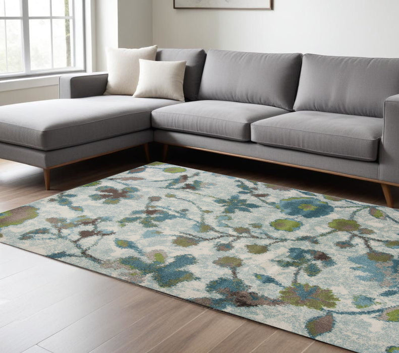 8' x 11' Machine Woven Floral Indoor Area Rug - Teal Blue
