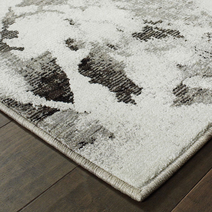 7' x 10' Abstract Power Loom Area Rug - Gray And White