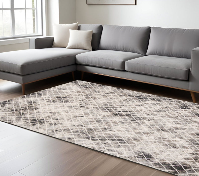 6.6' x 9.5' Abstract Stain Resistant Area Rug - Ivory Gray And Taupe